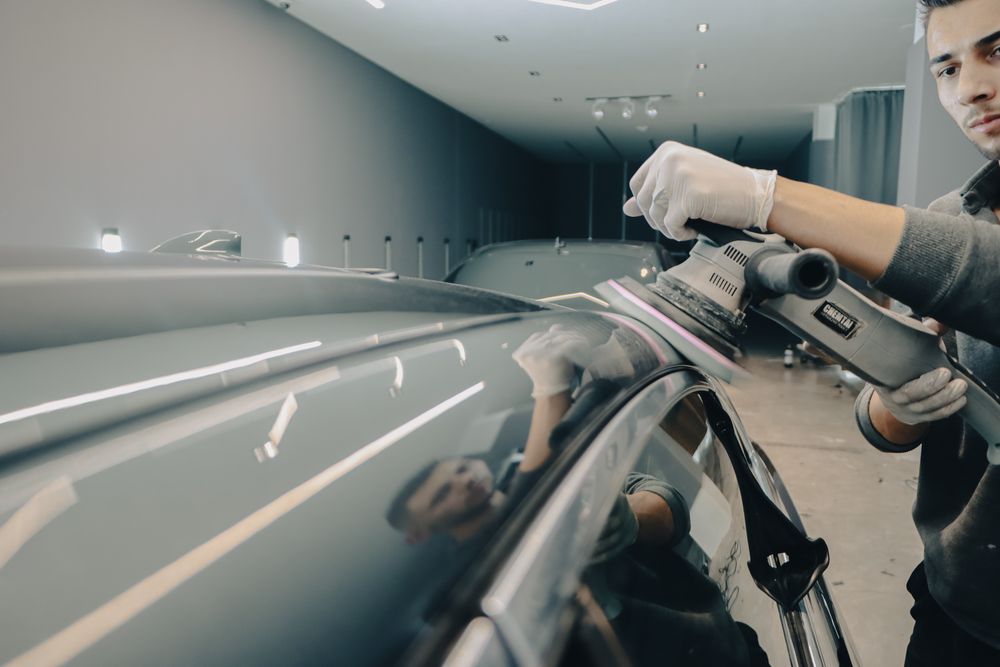Machine polishing glossy car paintwork